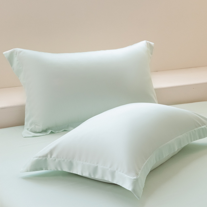 91家纺网 家纺一手货源 找家纺 涵宸家纺  2025新款天丝-天丝棉-纯色单枕套-场景2 枕套-空绿