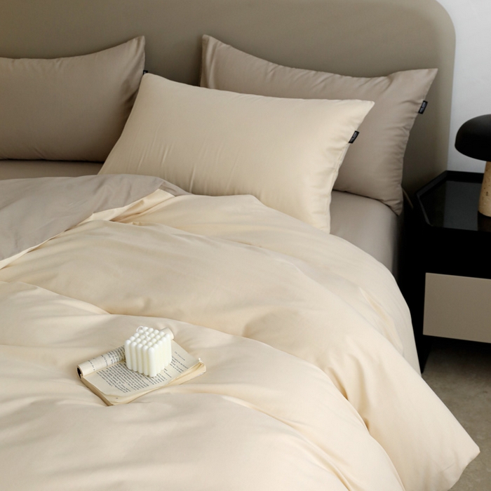 91家纺网 家纺一手货源 找家纺 2025年纯色双拼60支纯棉被套 奶白+岩石灰