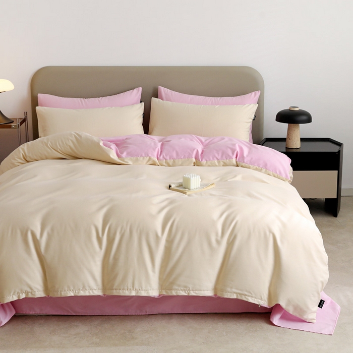 91家纺网 家纺一手货源 找家纺 2025年纯色双拼60支纯棉被套 奶白+白桃粉