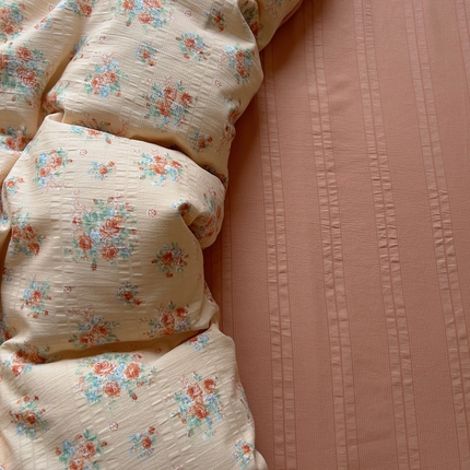 91家纺网 家纺一手货源 找家纺 王朝国际 2025新款皱皱棉印花四件套 蜜糖橘