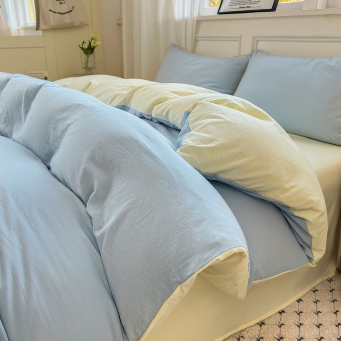 91家纺网 家纺一手货源 找家纺 冕悠家纺 2025新款A类105克超柔褶皱水洗棉拼色四件套 月白蓝+芝士黄