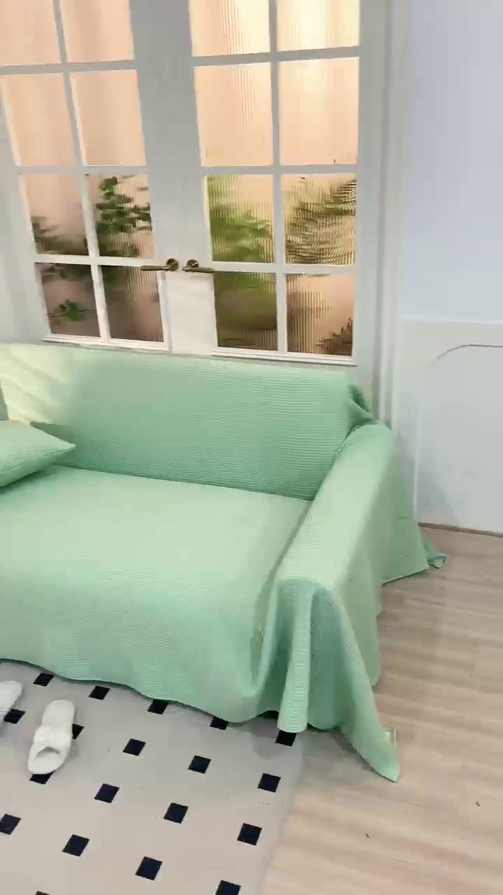 91家纺网 家纺一手货源 找家纺 沐沐家纺 2026新款冰豆豆华夫格沙发巾 绿色