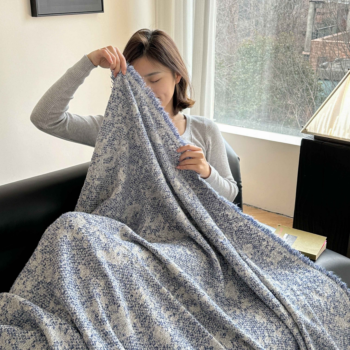 91家纺网 家纺一手货源 找家纺 金丝鸟家纺 2025春夏新款高端羊毛混纺盖毯毯子盖毯多功能盖毯飞机毯 利文 兰