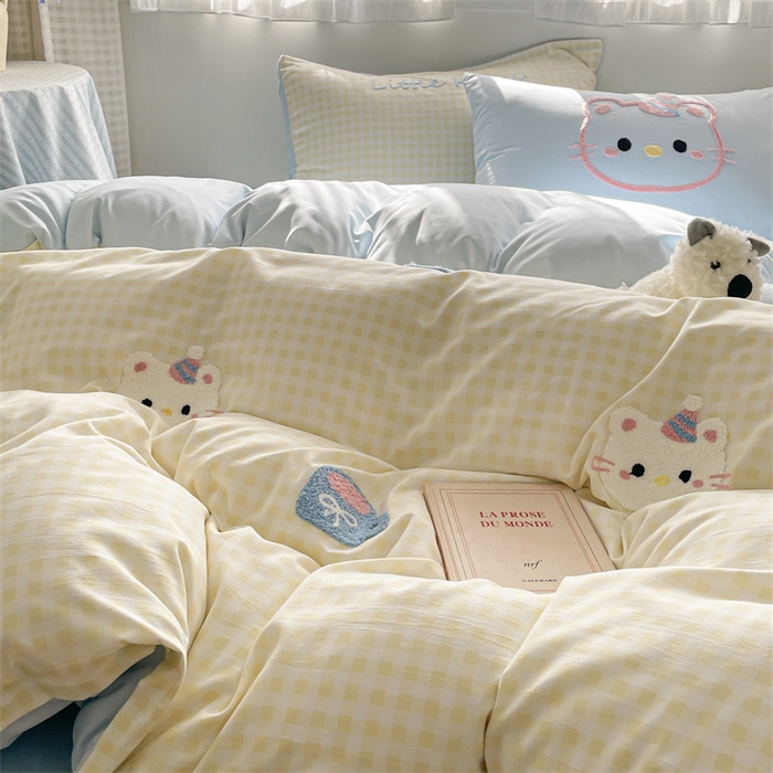 91家纺网 家纺一手货源 找家纺 星座家纺 2025新款水洗棉毛巾绣四件套 笑脸KT 浅黄