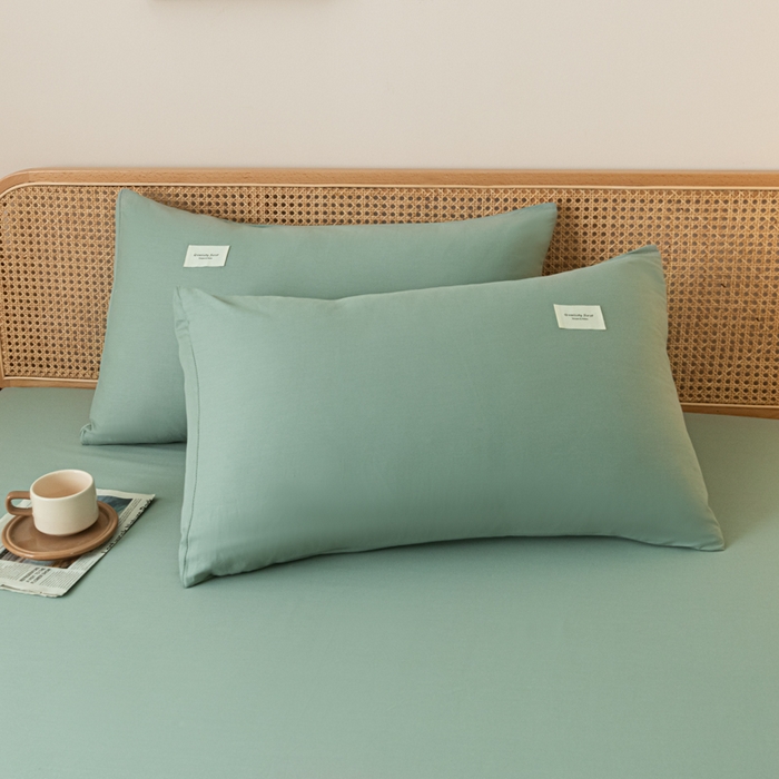 91家纺网 家纺一手货源 找家纺 梵克保罗 2025新款亲肤舒适全棉13372喷气纯色单枕套 果绿