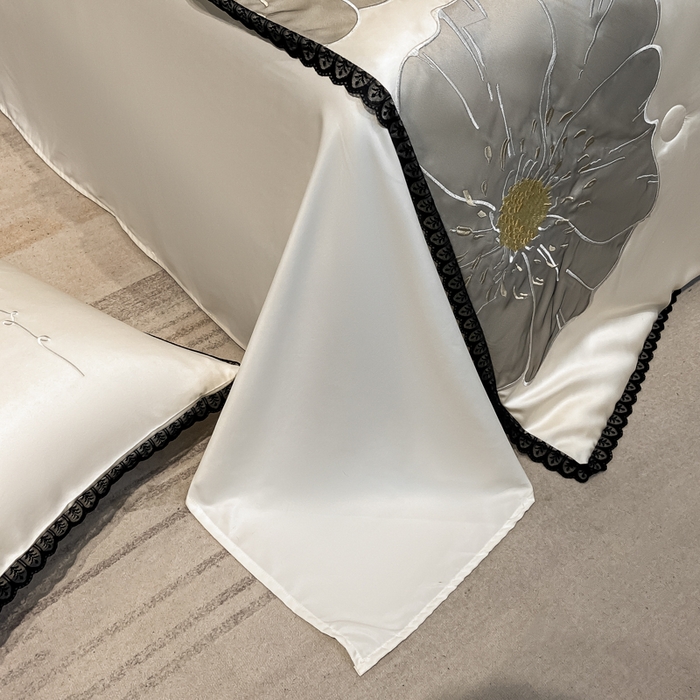 91家纺网 家纺一手货源 找家纺 （总）子由家居 2025新款水洗真丝贴布绣花花边夏被四件套-太阳花