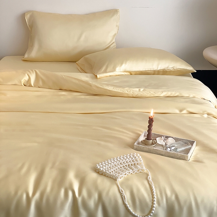 91家纺网 家纺一手货源 找家纺 繁花家居  2025新款亲肤舒适A类高支密冰丝素色冰丝四件套-风格一 黄桃蜜恋