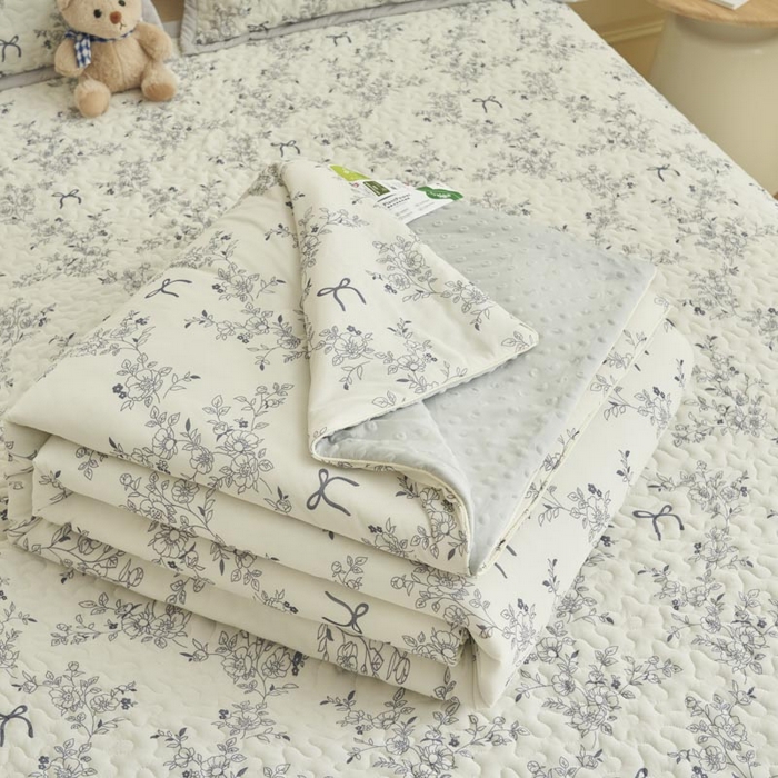 91家纺网 家纺一手货源 找家纺 子由家居 2025新款凉感丝豆豆夏被四件套 凉感豆豆被-语叶