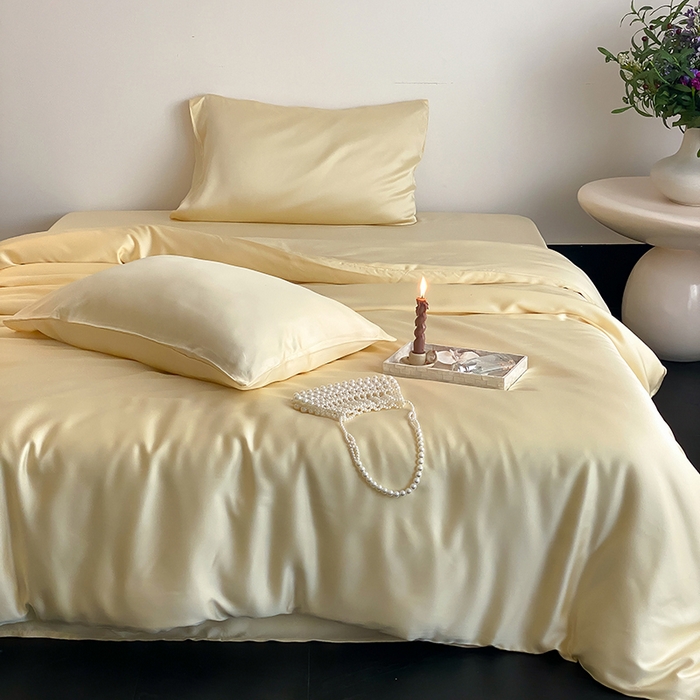 91家纺网 家纺一手货源 找家纺 繁花家居  2025新款亲肤舒适A类高支密冰丝素色冰丝四件套-风格一 黄桃蜜恋