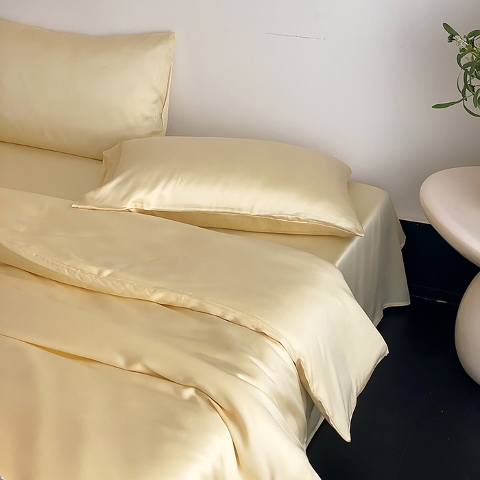 91家纺网 家纺一手货源 找家纺 繁花家居  2025新款亲肤舒适A类高支密冰丝素色冰丝四件套-风格一 黄桃蜜恋