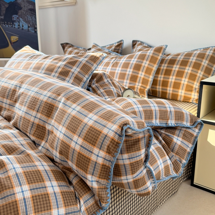 91家纺网 家纺一手货源 找家纺 金丝鸟家纺 2025新款全棉双层纱贝壳边四件套格子系列 青梅田格