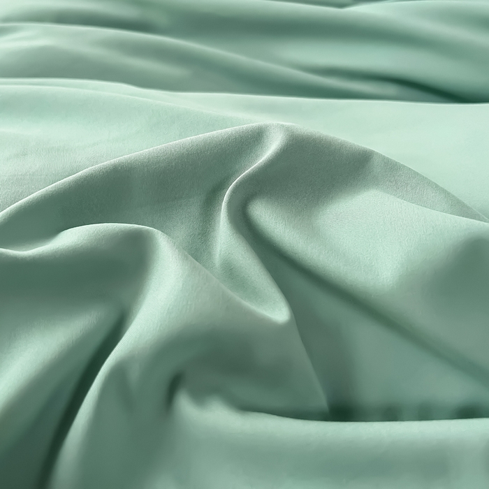 91家纺网 家纺一手货源 找家纺 曲之慕 2025新品四季款高端刺绣四件套简约可水洗轻奢纯色刺绣四件套 大麦浅绿