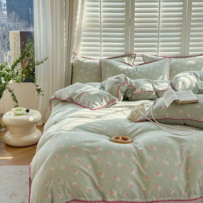 91家纺网 家纺一手货源 找家纺 金丝鸟家纺 2025新款全棉双层纱贝壳边四件套花卉系列 绿色蝴蝶结