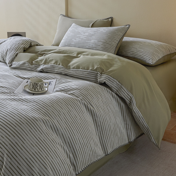 91家纺网 家纺一手货源 找家纺 2025新款亲肤全棉三层纱提花四件套 韵律-黛绿