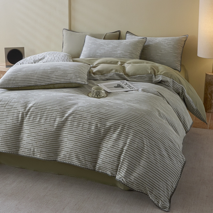 91家纺网 家纺一手货源 找家纺 2025新款亲肤全棉三层纱提花四件套 韵律-黛绿