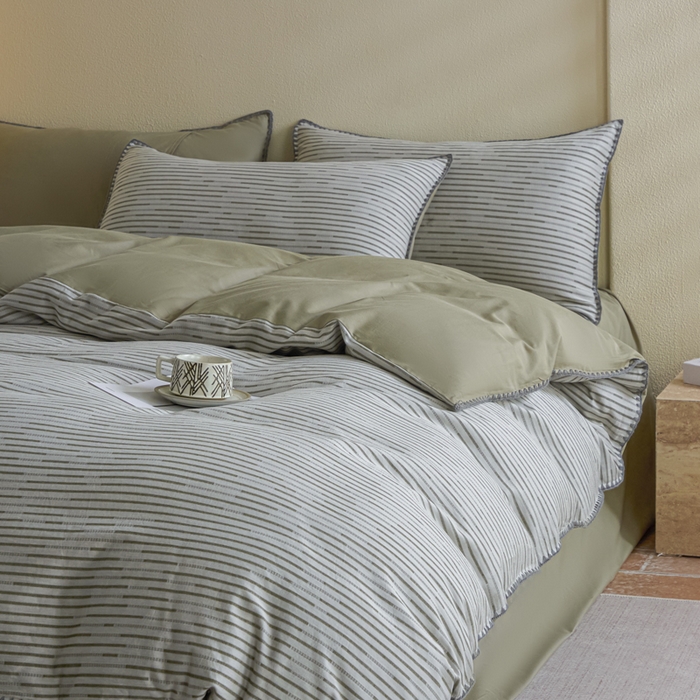 91家纺网 家纺一手货源 找家纺 2025新款亲肤全棉三层纱提花四件套 韵律-黛绿