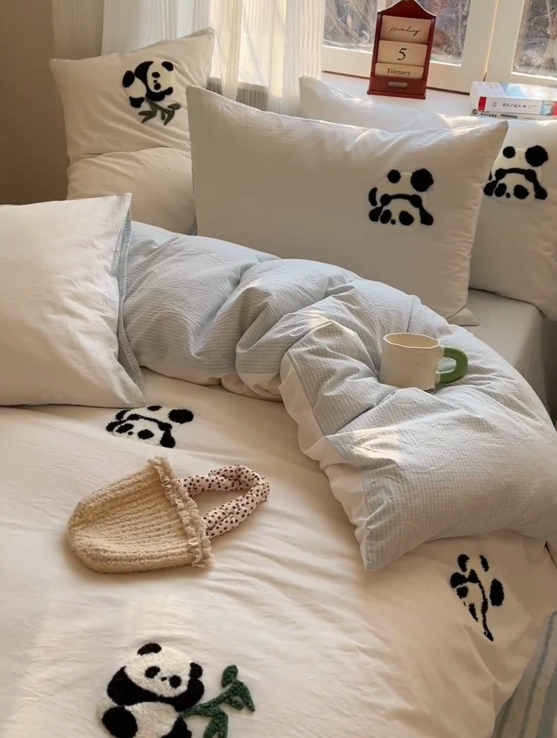 91家纺网 家纺一手货源 找家纺 慕尚家纺 2025新款春夏新款色织水洗棉毛巾绣四件套 熊猫 米白