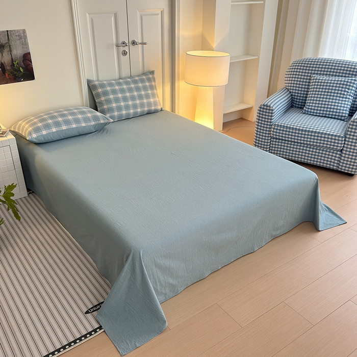 91家纺网 家纺一手货源 找家纺 玖弘家居 2025新款水洗棉格子系列四件套 柔光格蓝