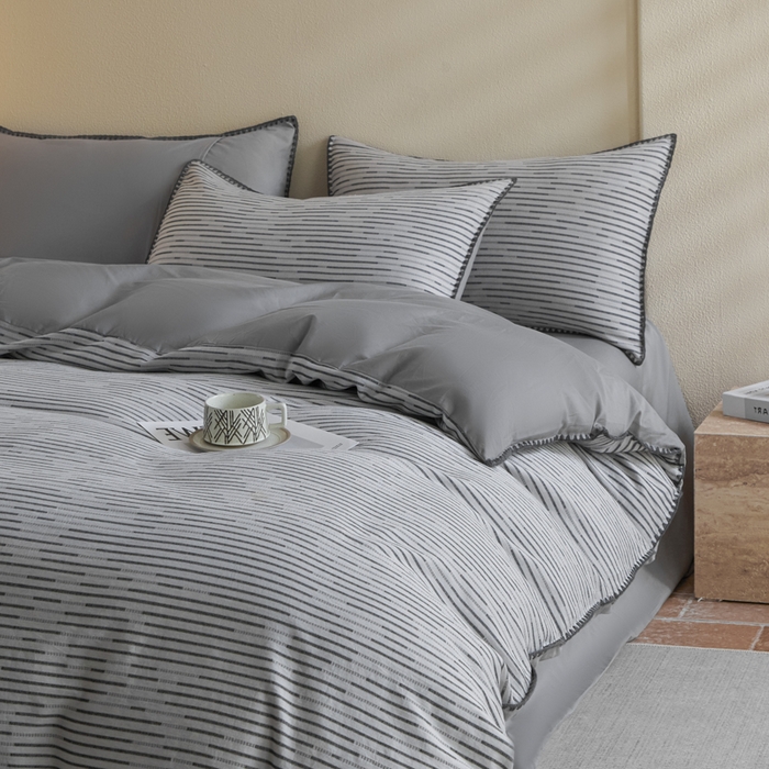 91家纺网 家纺一手货源 找家纺 2025新款亲肤全棉三层纱提花四件套 韵律-星灰