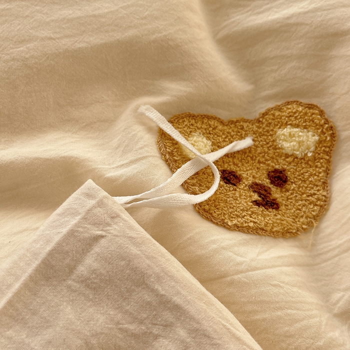 91家纺网 家纺一手货源 找家纺 慕尚家纺 2025新款春夏新款色织水洗棉毛巾绣四件套 嘟嘟熊 白