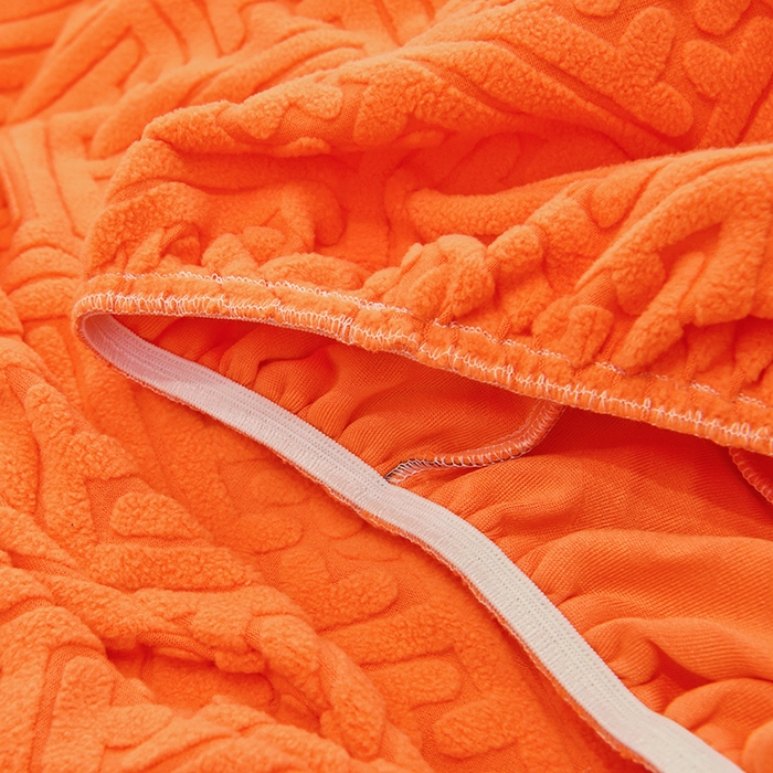 91家纺网 家纺一手货源 找家纺 启博家纺 2025新款磨毛提花功能款毛毛虫沙发套 橙色