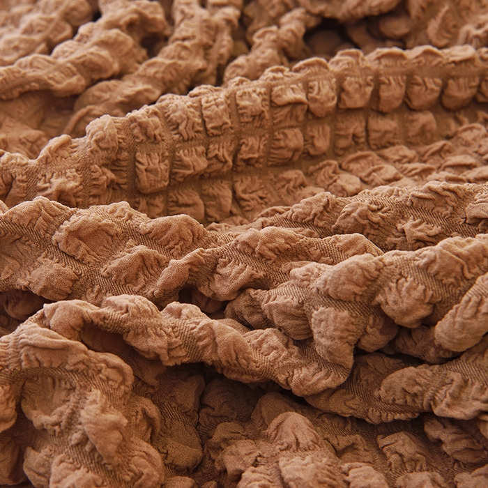 91家纺网 家纺一手货源 找家纺 启博家纺 2025新款泡泡纱功能款毛毛虫沙发套 驼色