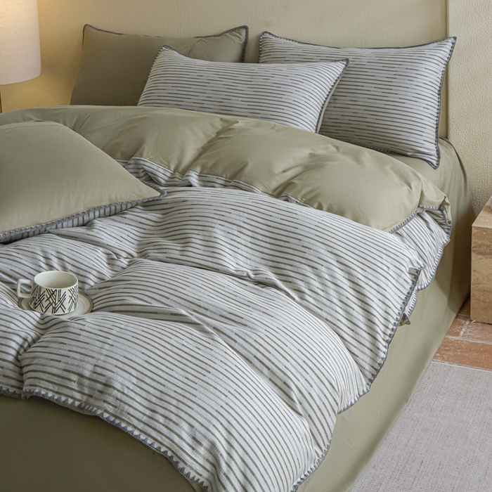 91家纺网 家纺一手货源 找家纺 2025新款亲肤全棉三层纱提花四件套 韵律-黛绿