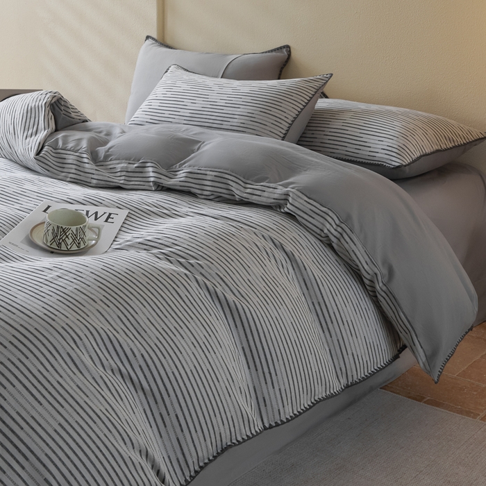 91家纺网 家纺一手货源 找家纺 2025新款亲肤全棉三层纱提花四件套 韵律-星灰