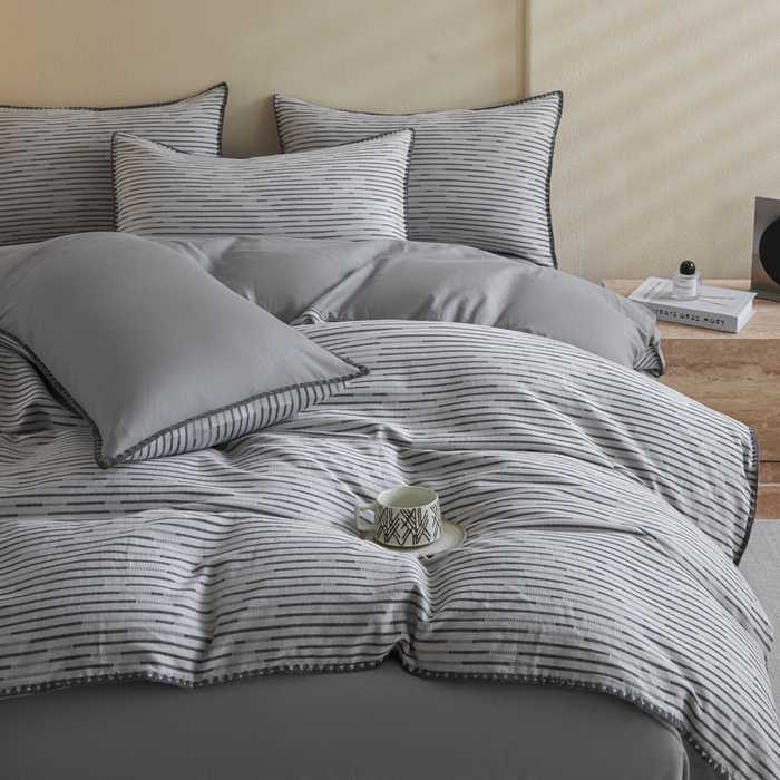 91家纺网 家纺一手货源 找家纺 2025新款亲肤全棉三层纱提花四件套 韵律-星灰