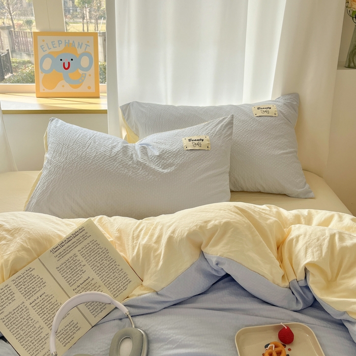 91家纺网 家纺一手货源 找家纺 桃心家居 2025新款A类韩系亲肤软糯甜格泡泡水洗棉撞色奶呼呼织标蝴蝶少女四件套 泡泡水洗棉-A甜格蓝黄