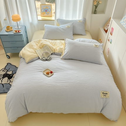 91家纺网 家纺一手货源 找家纺 （总）桃心家居 2025新款A类韩系亲肤软糯甜格泡泡水洗棉撞色奶呼呼织标蝴蝶少女四件套