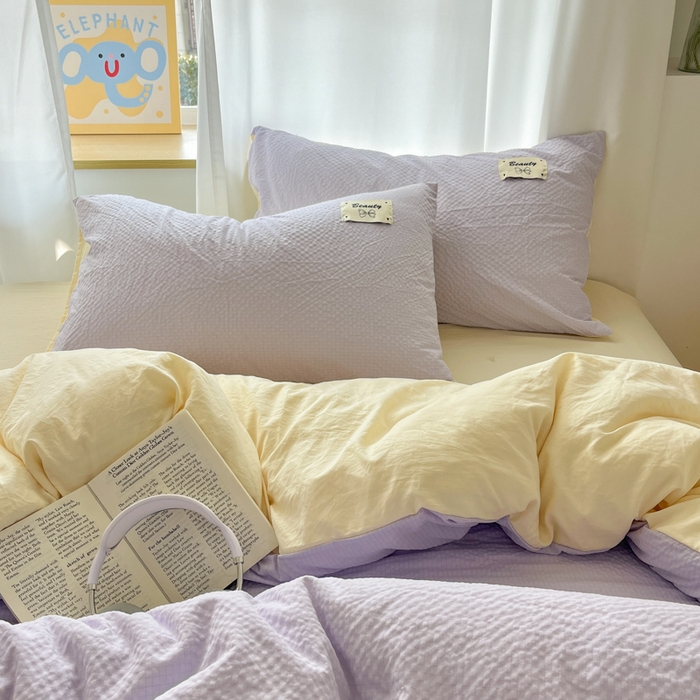 91家纺网 家纺一手货源 找家纺 桃心家居 2025新款A类韩系亲肤软糯甜格泡泡水洗棉撞色奶呼呼织标蝴蝶少女四件套 泡泡水洗棉-甜格紫黄