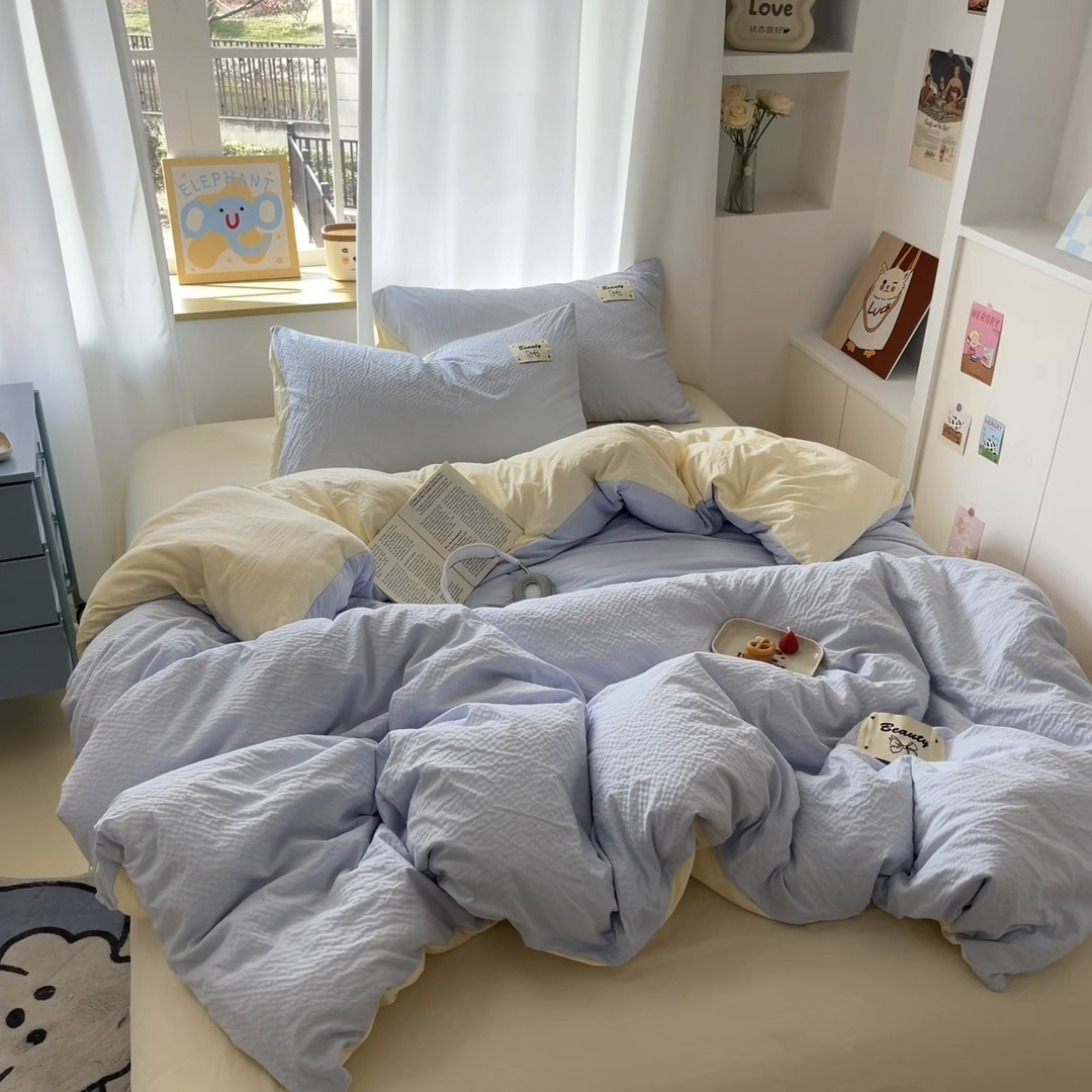 91家纺网 家纺一手货源 找家纺 桃心家居 2025新款A类韩系亲肤软糯甜格泡泡水洗棉撞色奶呼呼织标蝴蝶少女四件套 泡泡水洗棉-A甜格蓝黄