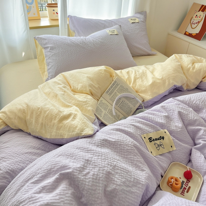 91家纺网 家纺一手货源 找家纺 桃心家居 2025新款A类韩系亲肤软糯甜格泡泡水洗棉撞色奶呼呼织标蝴蝶少女四件套 泡泡水洗棉-甜格紫黄