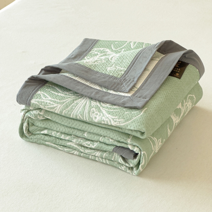 91家纺网 家纺一手货源 找家纺 2025新款A类纯棉针织三层纱提花多功能毯 绿色-花束