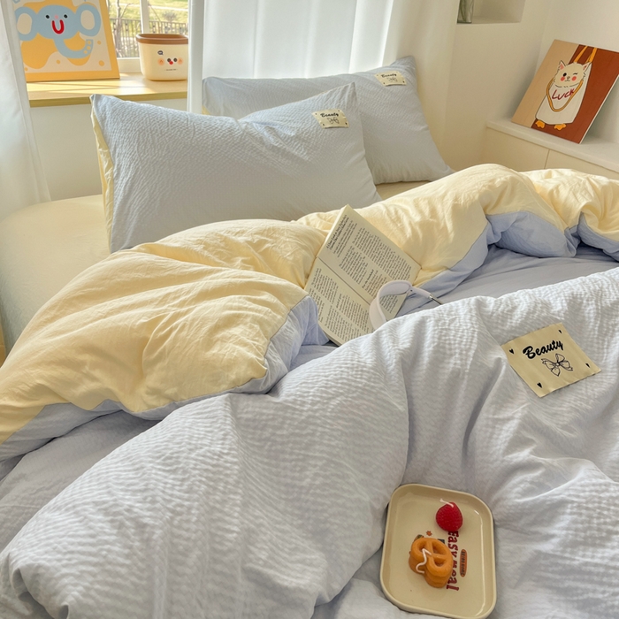 91家纺网 家纺一手货源 找家纺 桃心家居 2025新款A类韩系亲肤软糯甜格泡泡水洗棉撞色奶呼呼织标蝴蝶少女四件套 泡泡水洗棉-A甜格蓝黄