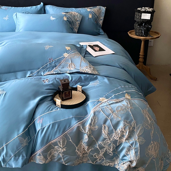 91家纺网 家纺一手货源 找家纺 优悦生活馆 2025新款冰丝浮雕绣花四件套 幽兰轻舞-蓝