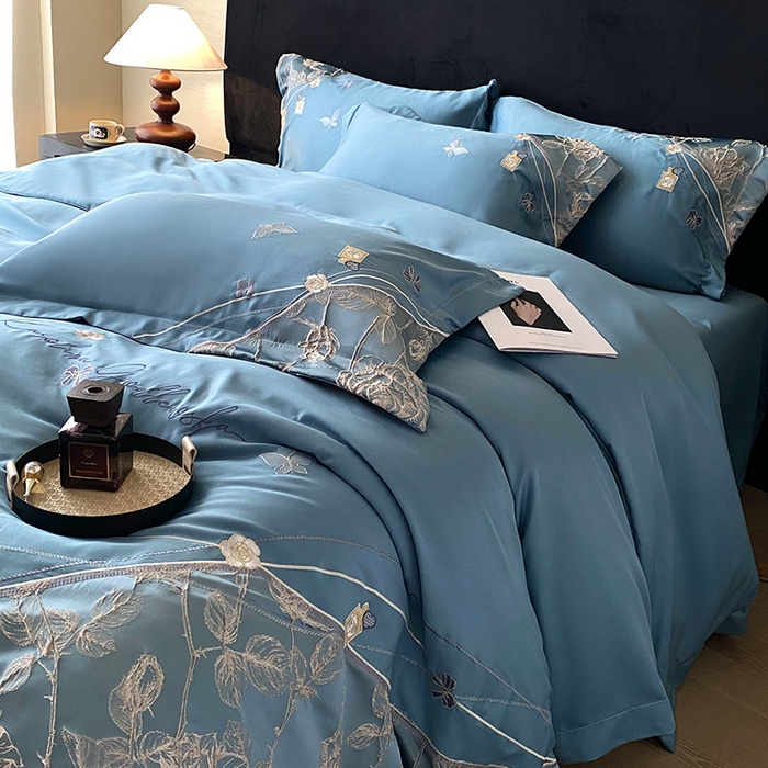 91家纺网 家纺一手货源 找家纺 优悦生活馆 2025新款冰丝浮雕绣花四件套 幽兰轻舞-蓝