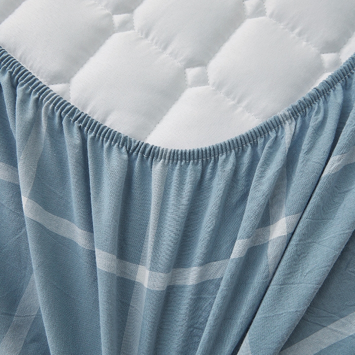 91家纺网 家纺一手货源 找家纺 喜居家纺2025新款A类水洗棉夹棉棉花床笠垫 棉-冰岛蓝