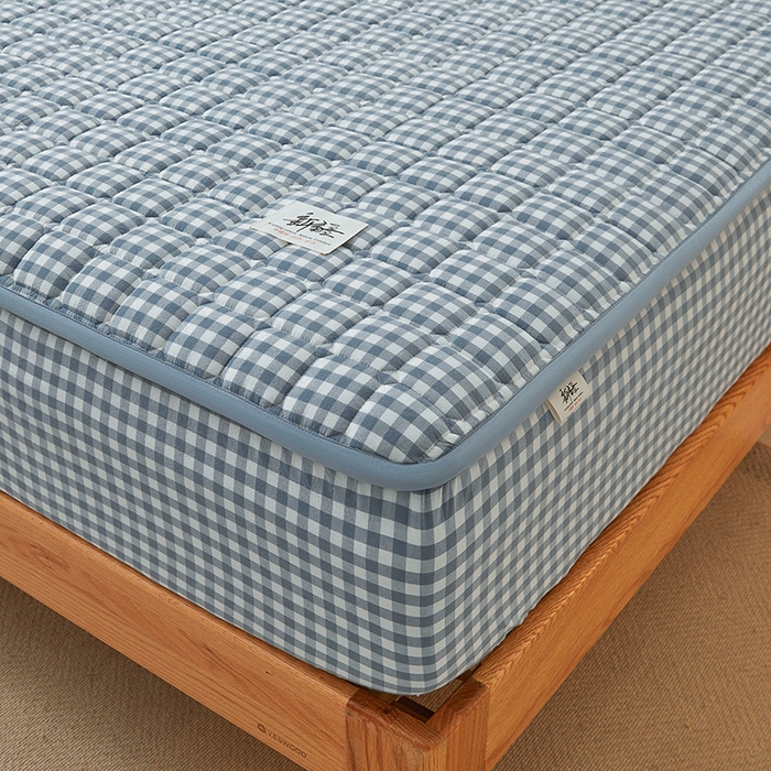 91家纺网 家纺一手货源 找家纺 喜居家纺2025新款A类水洗棉夹棉棉花床笠垫 棉-简蓝格