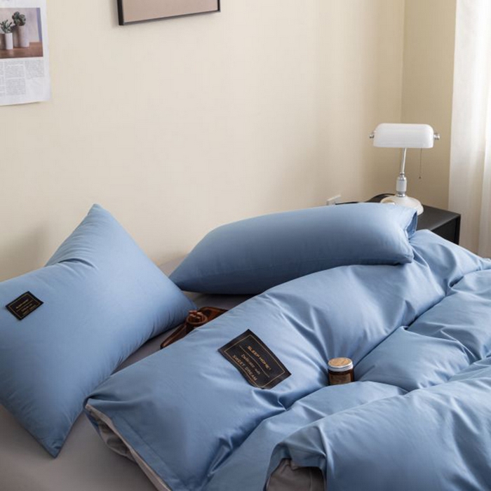 91家纺网 家纺一手货源 找家纺 恋之语 2025新款90克纯色双拼单被套 海洋蓝+浅灰