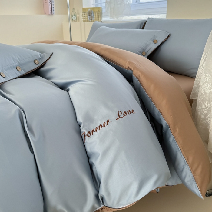 91家纺网 家纺一手货源 找家纺 2025新款A类纯色双拼长绒棉纯棉刺绣四件套 驼韵蓝调