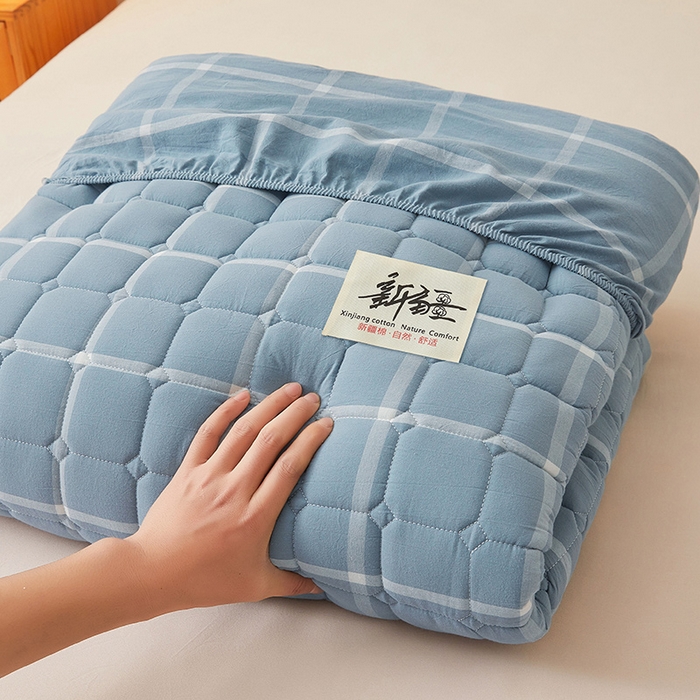 91家纺网 家纺一手货源 找家纺 喜居家纺2025新款A类水洗棉夹棉棉花床笠垫 棉-冰岛蓝