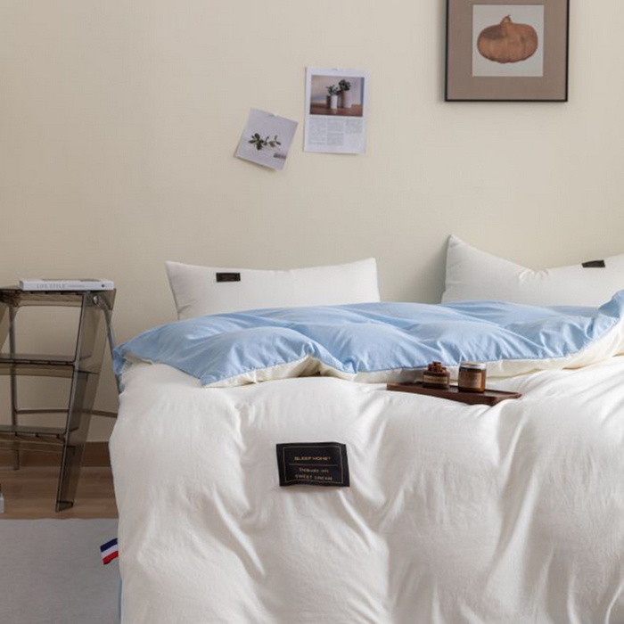 91家纺网 家纺一手货源 找家纺 恋之语 2025新款90克纯色双拼四件套 珍珠白+浅兰