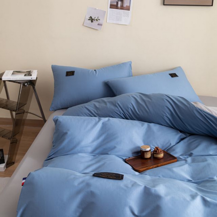 91家纺网 家纺一手货源 找家纺 恋之语 2025新款90克纯色双拼单被套 海洋蓝+浅灰