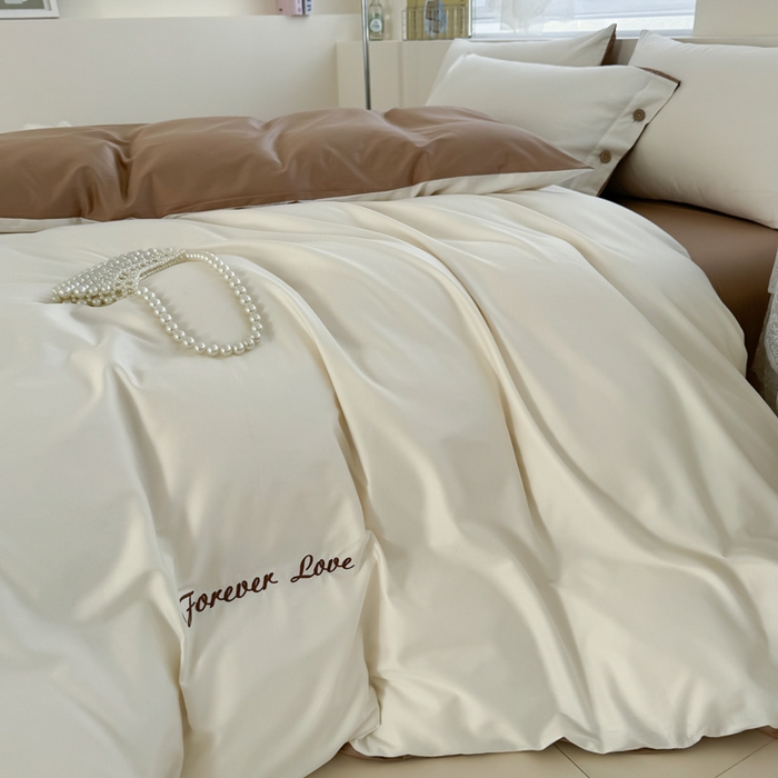 91家纺网 家纺一手货源 找家纺 2025新款A类纯色双拼长绒棉纯棉刺绣四件套 奶驼逸居