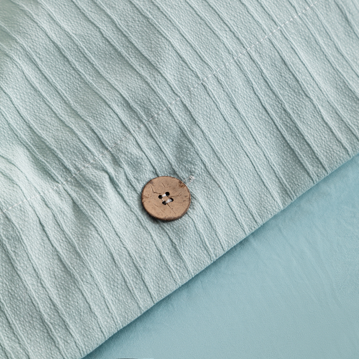 91家纺网 家纺一手货源 找家纺 恋之语 2025新款亲肤舒适提花纽扣款四件套 赛琳娜-天蓝