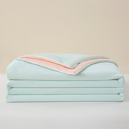 91家纺网 家纺一手货源 找家纺 米乐被业 2025新款凉感丝双拼夏被夏凉被空调被 冰绿蜜桃