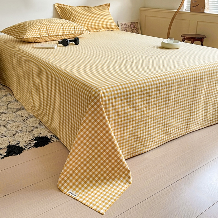 91家纺网 家纺一手货源 找家纺 久云居 2025新款亲肤舒适全棉色织防水床单 黄小格