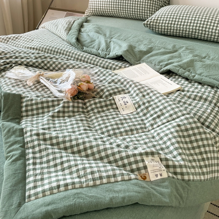 91家纺网 家纺一手货源 找家纺 2025梦初语新款无印风棉花夏被 绿小格